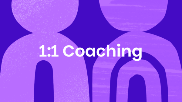 two stylised people made out of lilac semicircles with the words 1:1 coaching superimposed.